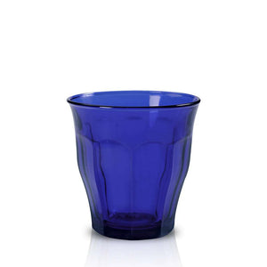 Blue glass tumbler on a white background