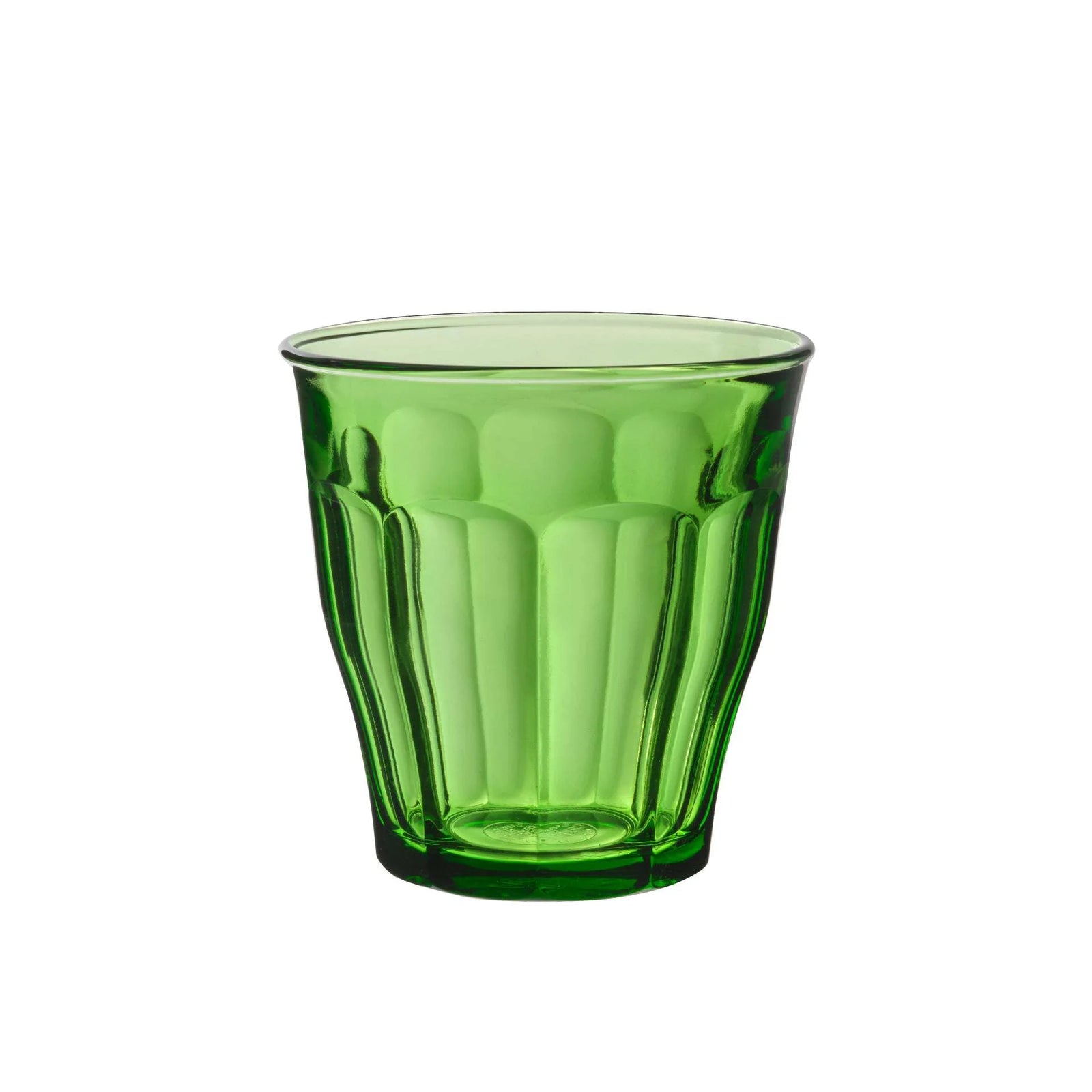 Green glass tumbler on a white background