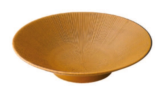 Mustard decorative bowl with textured surface on a white background