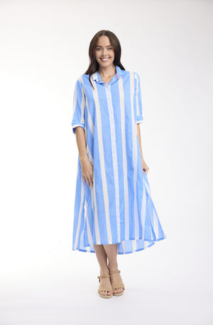 A woman modeling a light blue and white vertically striped midi shirt dress with three-quarter sleeves, standing against a plain white studio background.