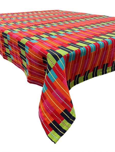 Colorful striped tablecloth with geometric pattern on a white background