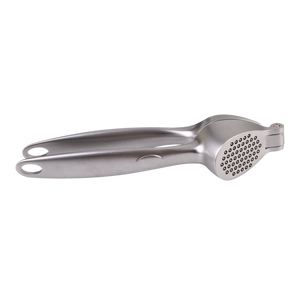 Stainless steel garlic press on a white background