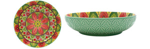 Set of colorful ceramic bowls with intricate patterns on a white background