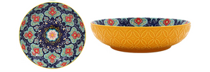 Set of colorful ceramic bowls with intricate patterns on a white background