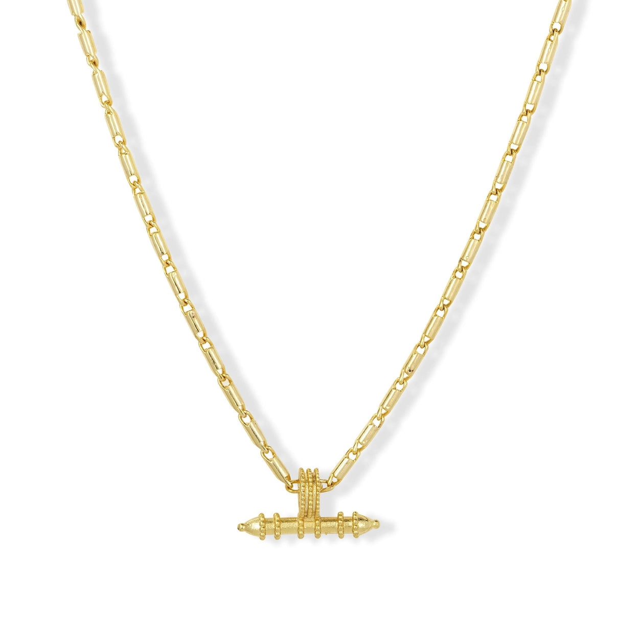 Gold necklace with a unique pendant on a white background