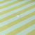 Close-up of fabric with green and light blue horizontal stripes.