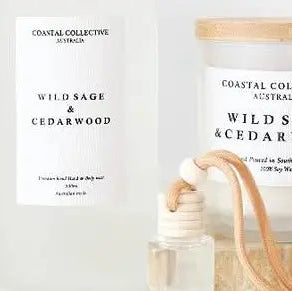 Collection of Wild Sage Cedarwood products including candles and diffusers on a white background.