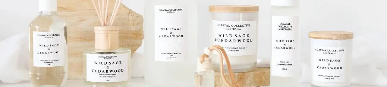 Collection of Wild Sage Cedarwood products including candles and diffusers on a white background.
