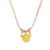 Necklace with gold charm and pink thread on a white background
