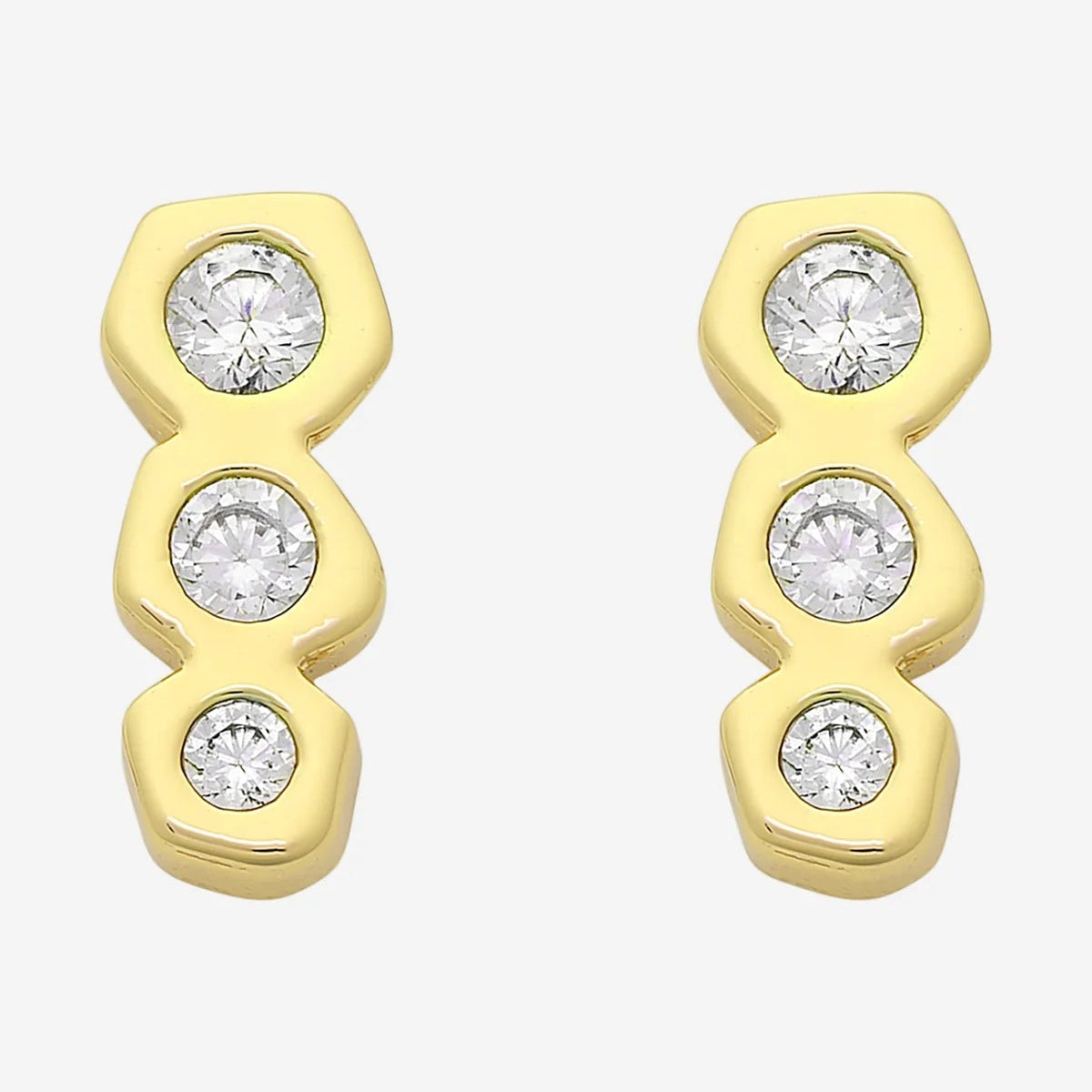 Gold earrings with clear gemstones on a white background