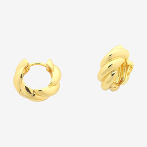 Gold hoop earrings on a white background