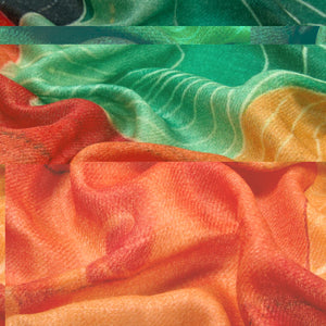 Close-up of colorful fabric with red, green, and orange hues.