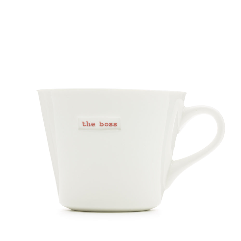 White mug with 'the boss' text on a white background