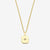 Gold necklace with a square pendant on a light gray background