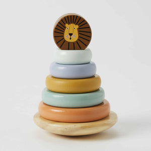 Stack of colorful wooden rings with a lion design on top against a white background