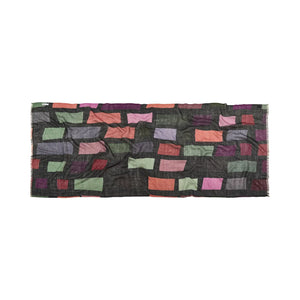 Multicolored fabric with a patchwork pattern on a white background