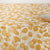 Tablecloth with yellow leaf pattern on a white background
