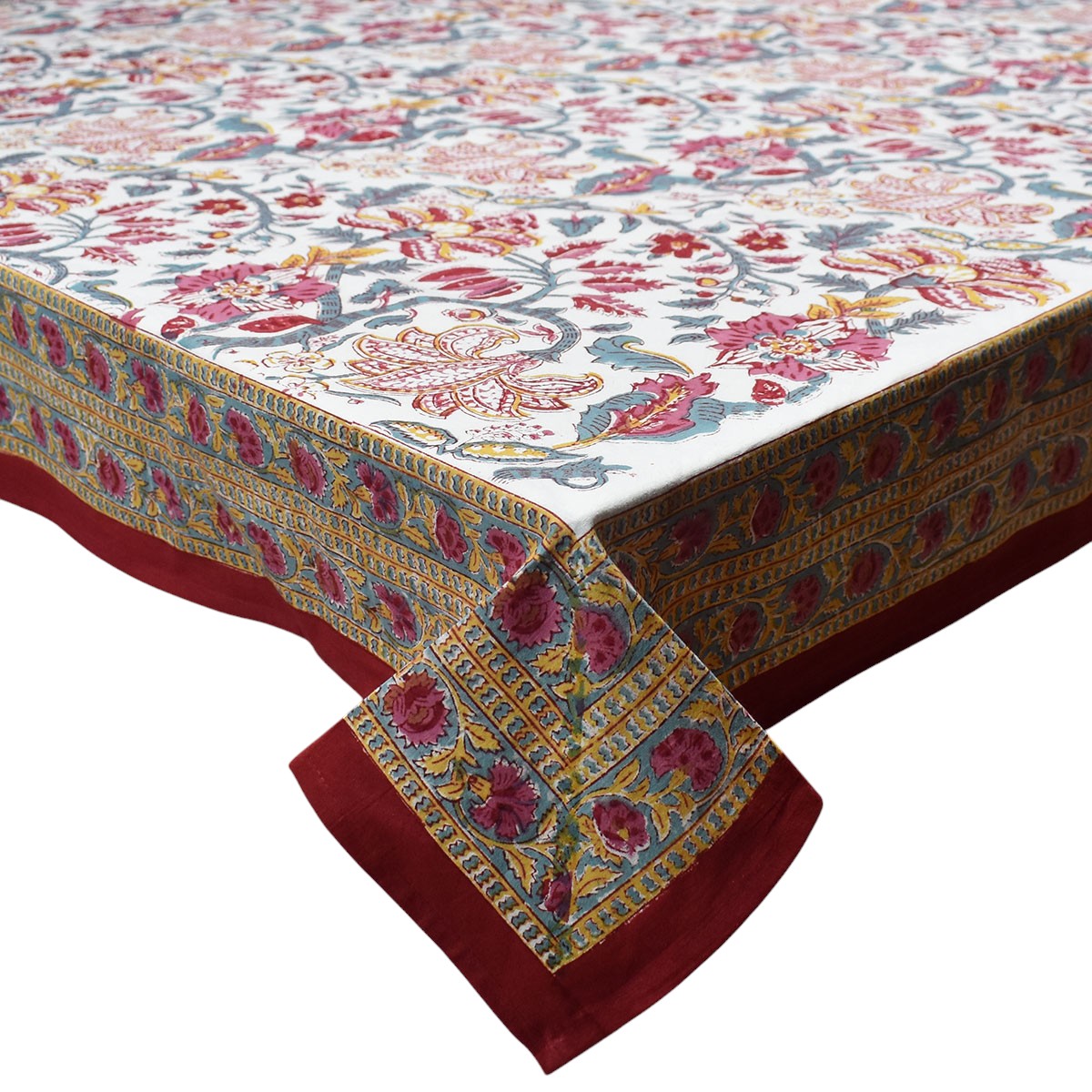 Decorative tablecloth with floral pattern and red border on a white background