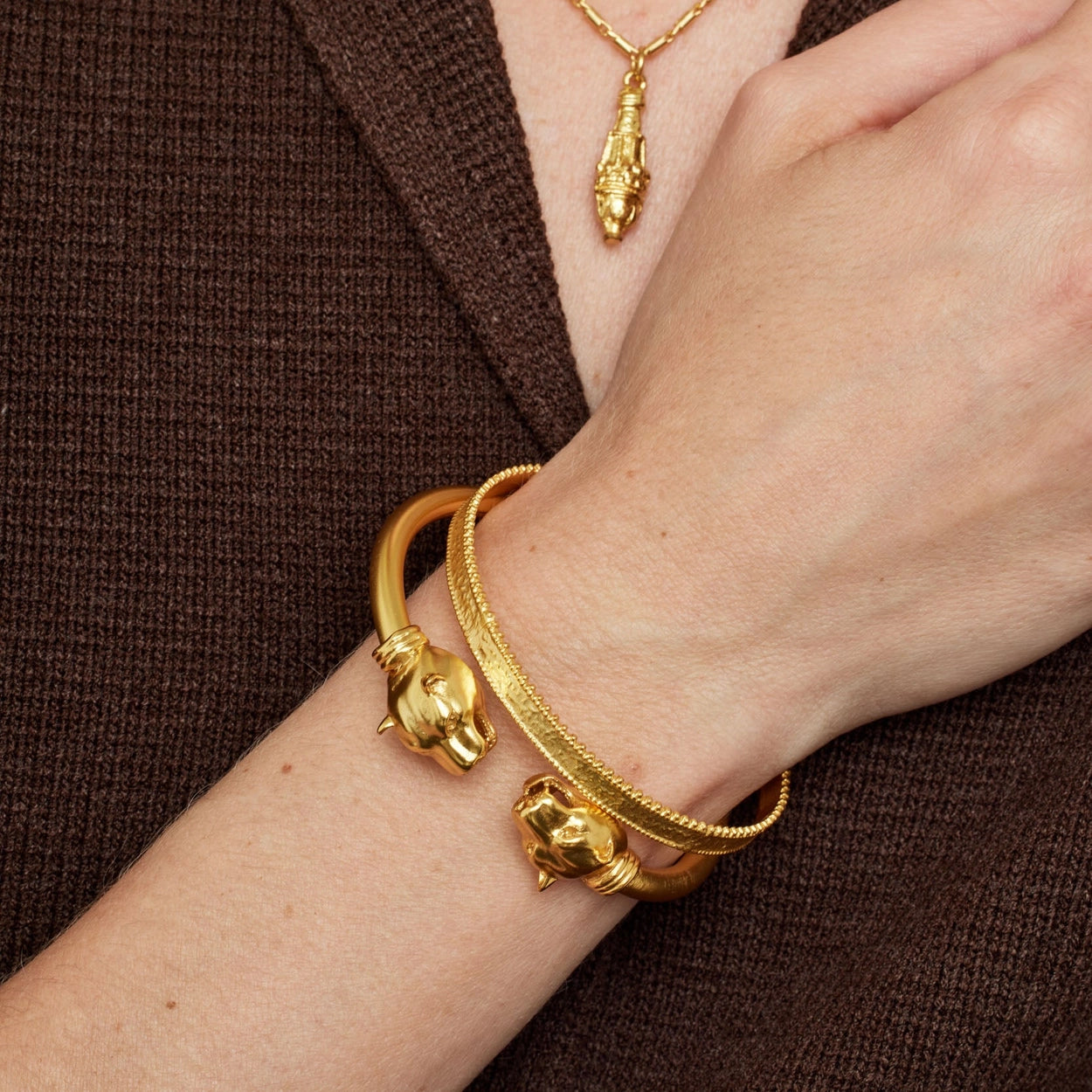 Gold bracelet on a white background