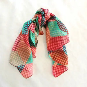 Colorful patterned scarf on a white background