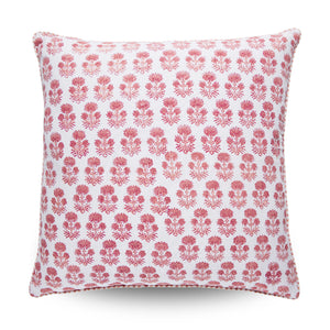 Floral patterned pillow with red flowers on a white background