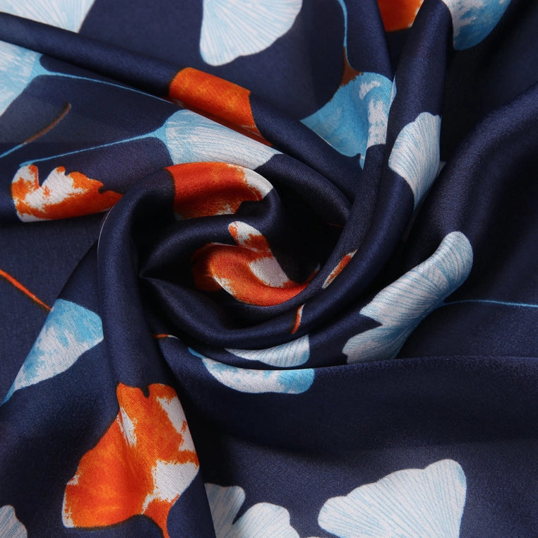 Celie Silk scarf-Rectangle-Navy Background-Cra Brder-Sky Blue and orange petal design-Designed in Italy