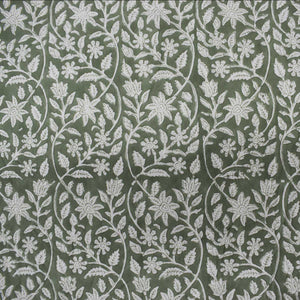 Floral vine pattern on a green background