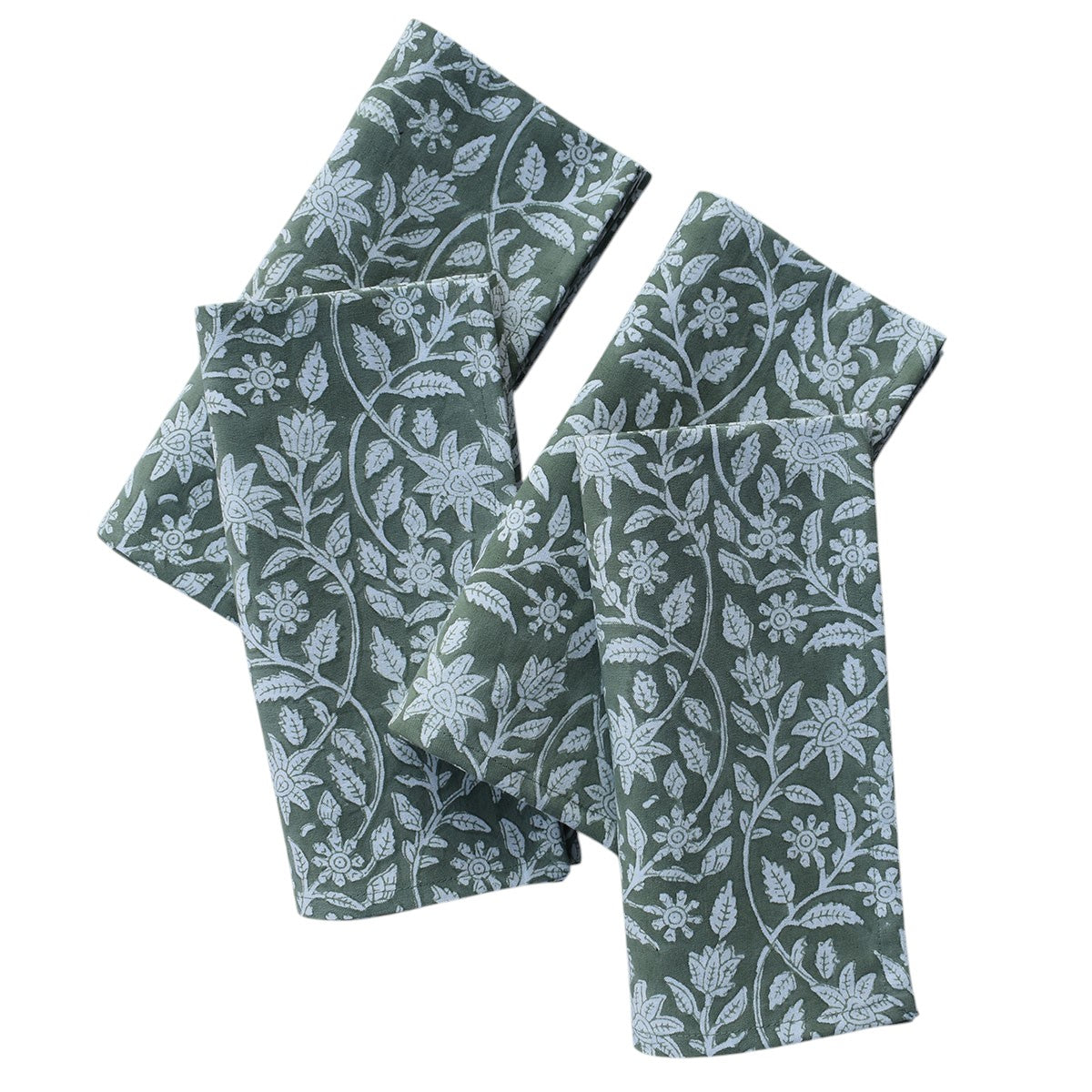Set of four green fabric napkins with floral patterns on a white background