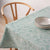 Orchard Tablecloth-Mint Green-Jacquard with fruit and Flower design-Stain Resistant-On table