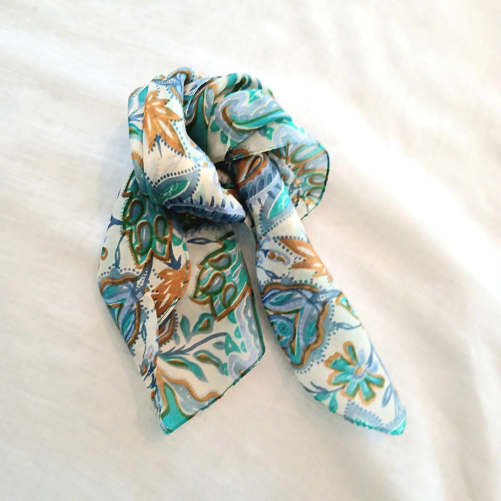 Floral patterned scarf on a white background