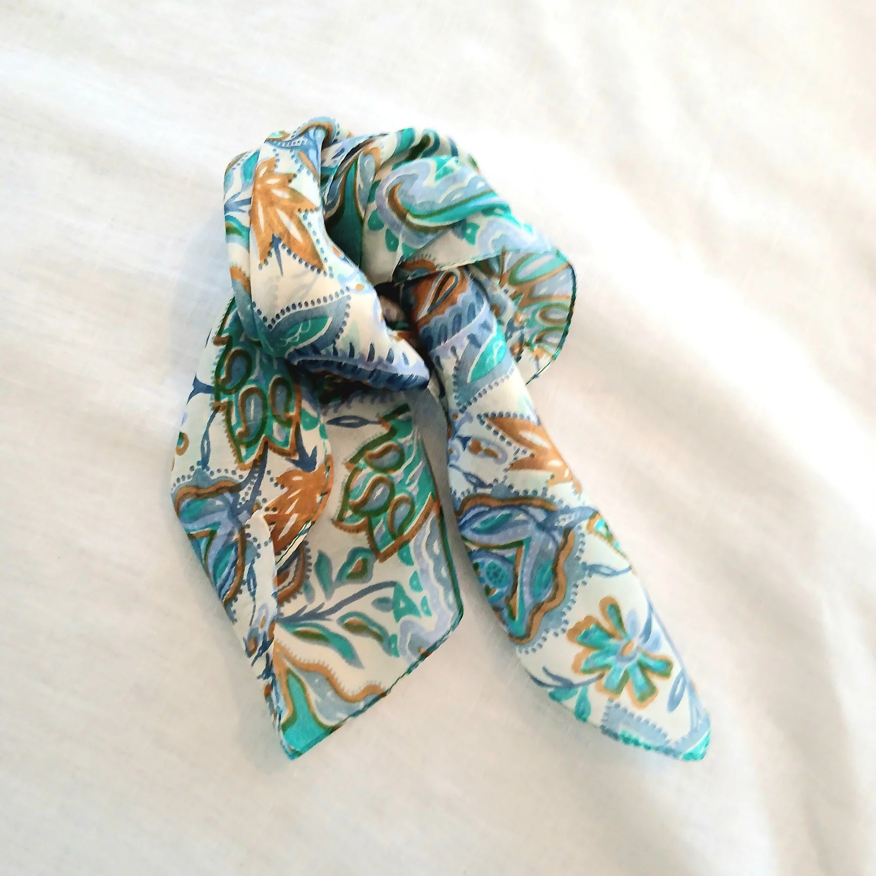 Floral patterned scarf on a white background