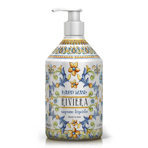 Decorative hand wash bottle with floral design on a white background