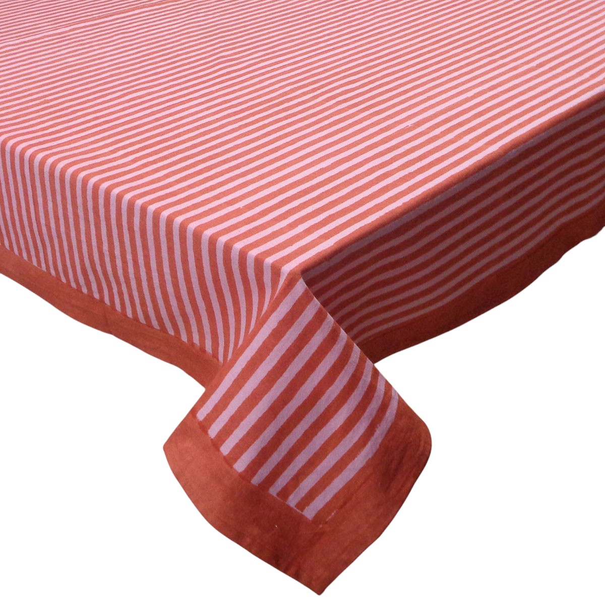 Red and pink striped tablecloth on a white background