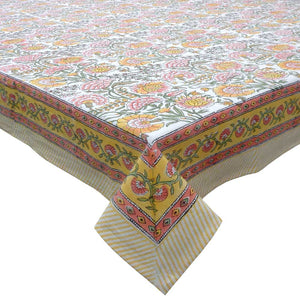 Colorful floral patterned tablecloth with a yellow border on a white background