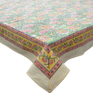 Colorful floral-patterned tablecloth with a yellow border on a white background