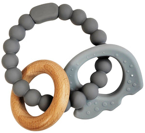 Two baby teething rings, one gray and one wooden, on a white background.
